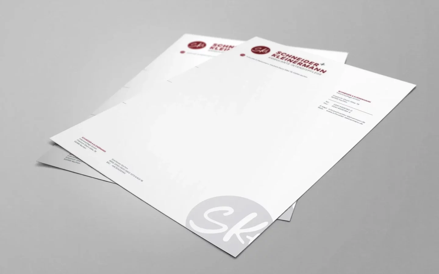 Briefpapier mit Schneider und Kleinermannlogo und Adressdaten